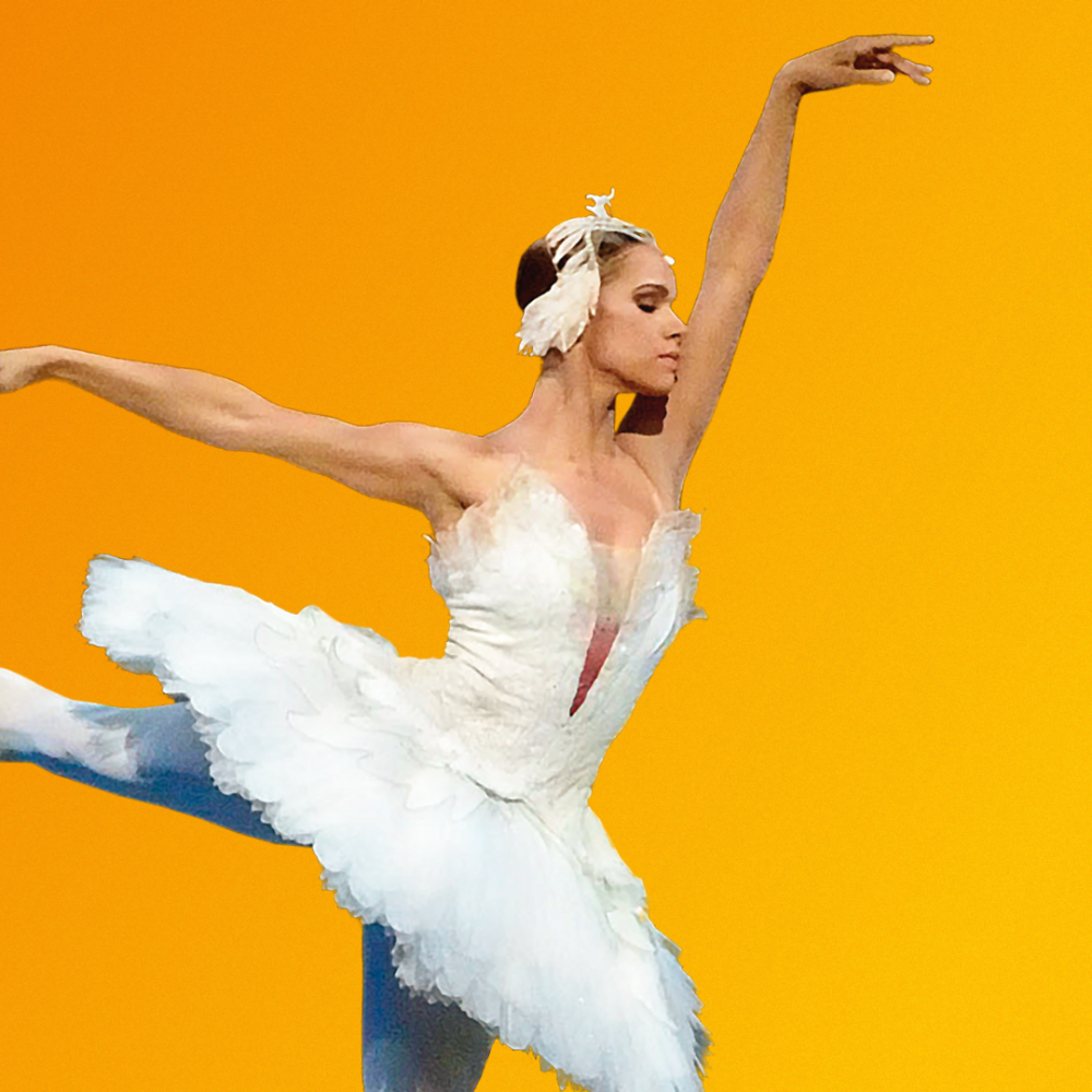 Misty Copeland in a white ballerina outfit performing for Swan Lake. Photo credit: Gene Schiavone