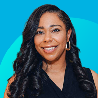 Headshot of Ay'Anna Moody smiling against a teal background